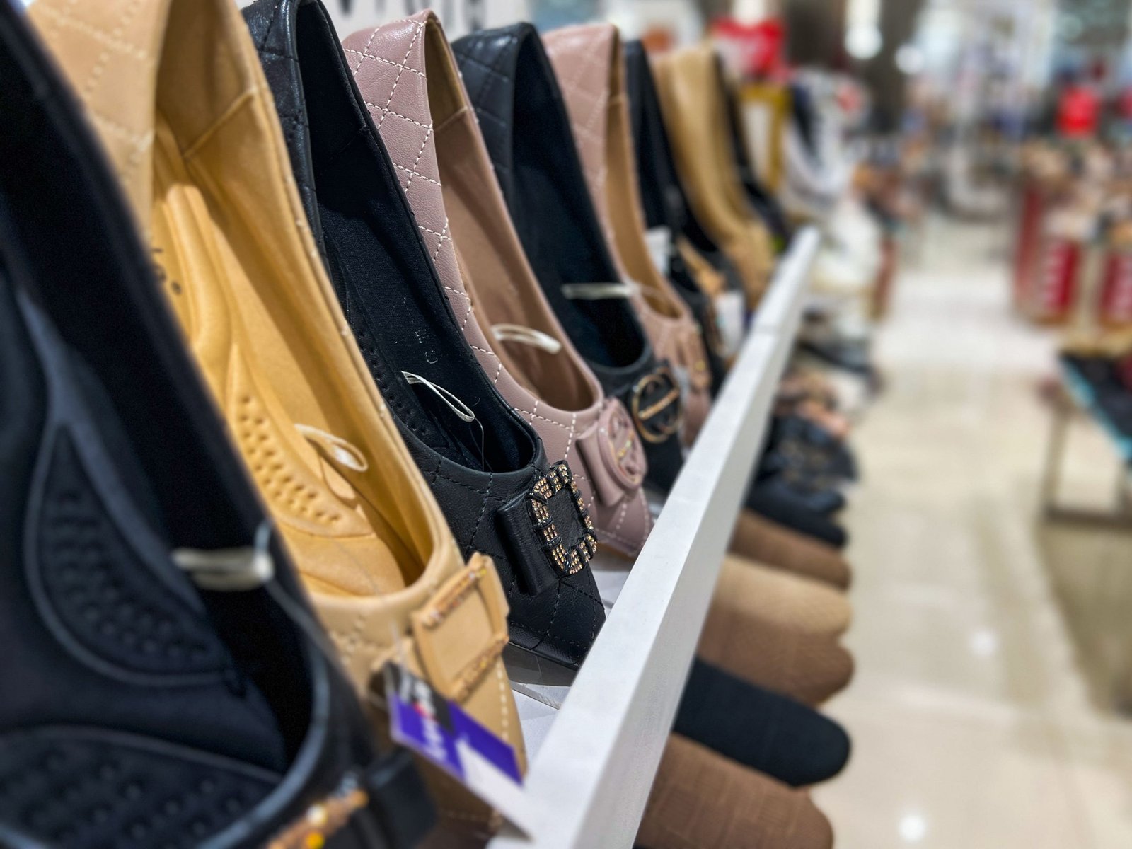 vecteezy-a-neat-and-organized-row-of-different-types-of-shoes-is-72645905